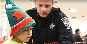 AH Police Department at Shop w/ a Cop day with D25 students. 